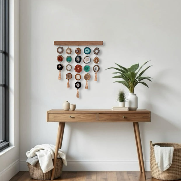 a wooden table topped with a potted plant next to a window