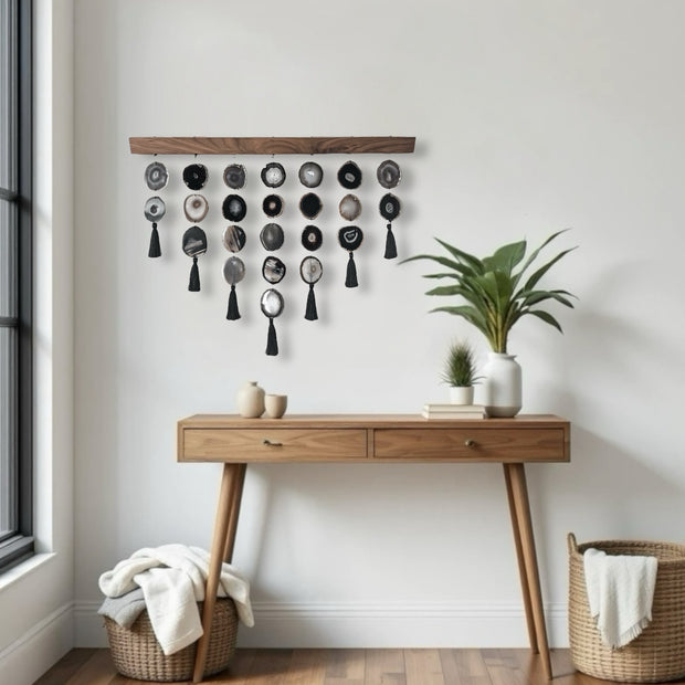 a wooden table topped with a potted plant next to a window