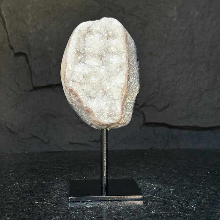 White quartz on stand, Geode with metallic base included for home decoration