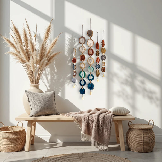 Nestled corner of a room with a wooden bench, decorative pillows, and wall art.