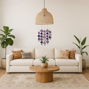 Living room with a beige sofa, wooden coffee table, and decorative elements.