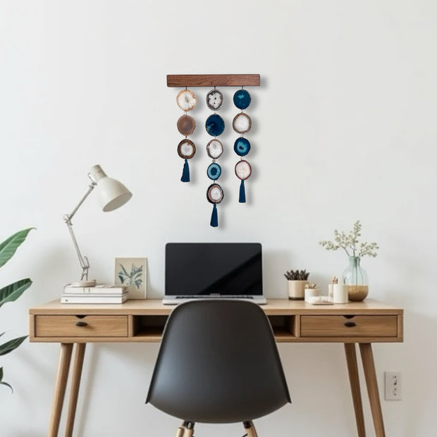 a wooden desk topped with a laptop computer