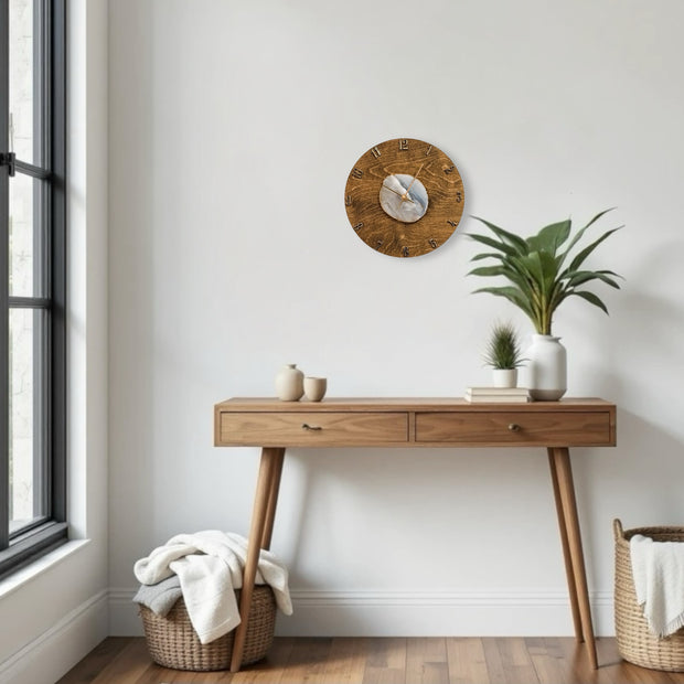 a wooden table with a potted plant on top of it